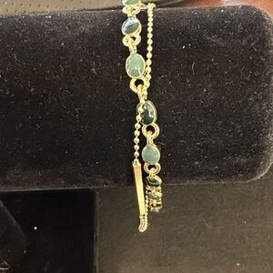 Elegant Gold and Green Bracelet